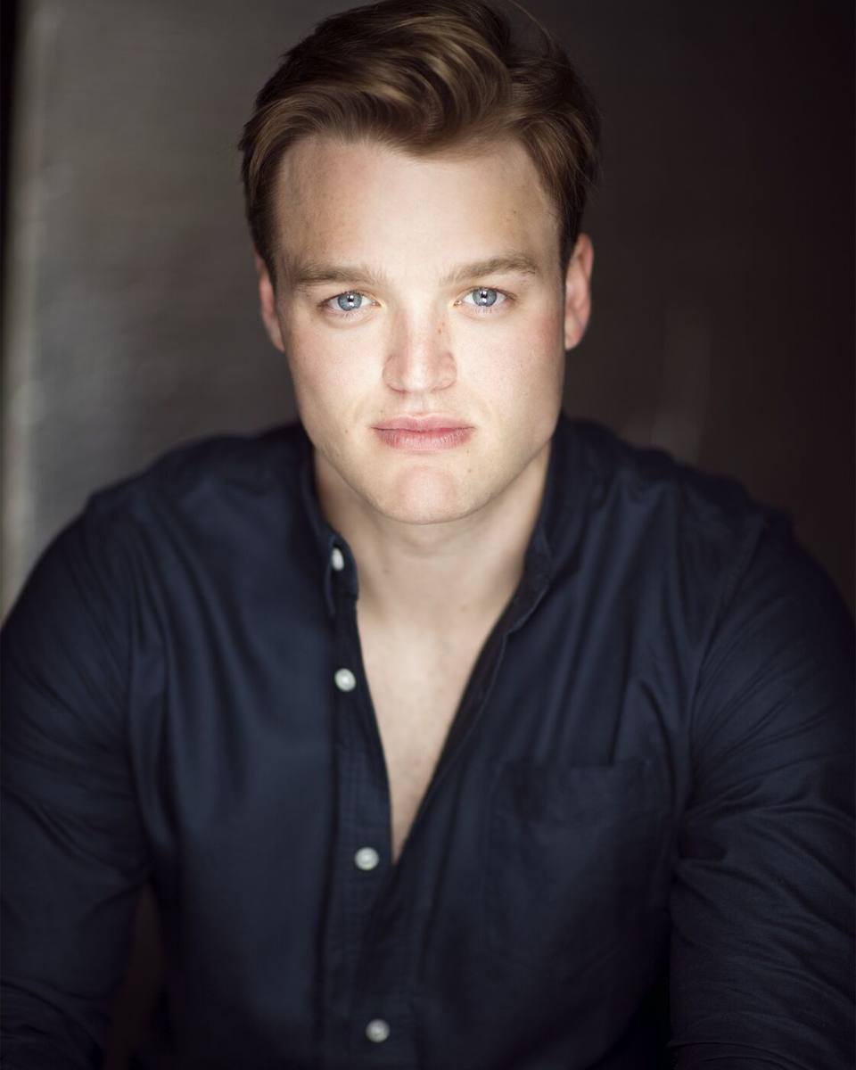 Haydan Hawkins earlier headshot, dark shirt