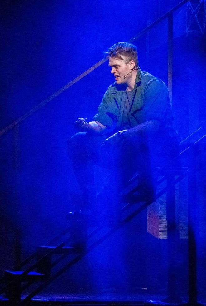 Chris alone on the stairs